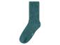 Une seule chaussette bleu turquoise avec texture côtelée et marquage de taille