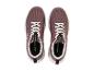 Een paar paarse Crivit sportschoenen met witte veters.