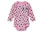 Un body bébé rose à manches longues avec Minnie Mouse et des pois noirs.