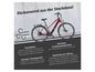 Een rode elektrische fiets met een bereik van 100 kilometer.