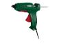 Groen PARKSIDE lijmpistool met rode trekker en witte lijmstick.