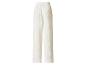 Pantalon large blanc pour femme avec taille élastiquée.