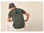 T-shirt vert pour homme avec imprimé palmier et texte 'BEACH CLUB Paradise' au dos.
