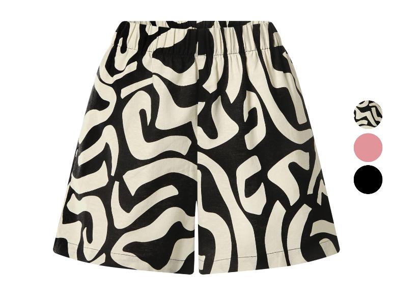 Shorts femme à motif abstrait noir et blanc avec taille élastique.