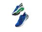 Twee paar Joma hardloopschoenen in blauw en groen.