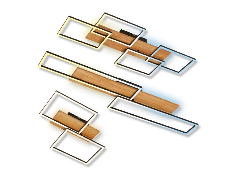 Drie moderne verlichtingsarmaturen met zwarte frames en LED-lampen, met houten accenten.