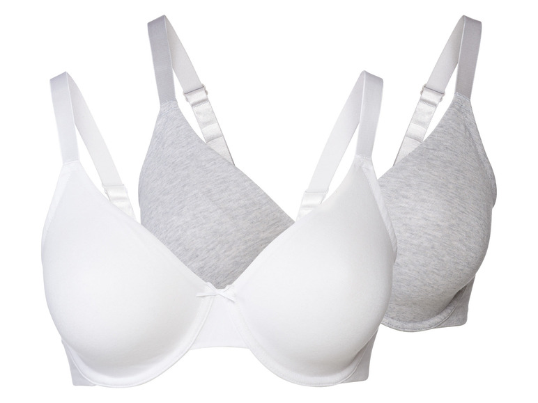 Twee witte en grijze bh's met brede bandjes.