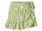 Dames minirok met groen-witte zebraprint, ruches en strik aan de zijkant.