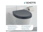 Een donkergrijze toiletbril van Schütte met een zachtsluitende deksel.