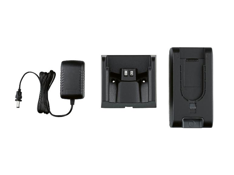 Chargeur de batterie avec adaptateur secteur et bloc-batterie.