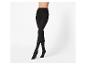 Collants noirs sur un modèle, sur fond blanc.