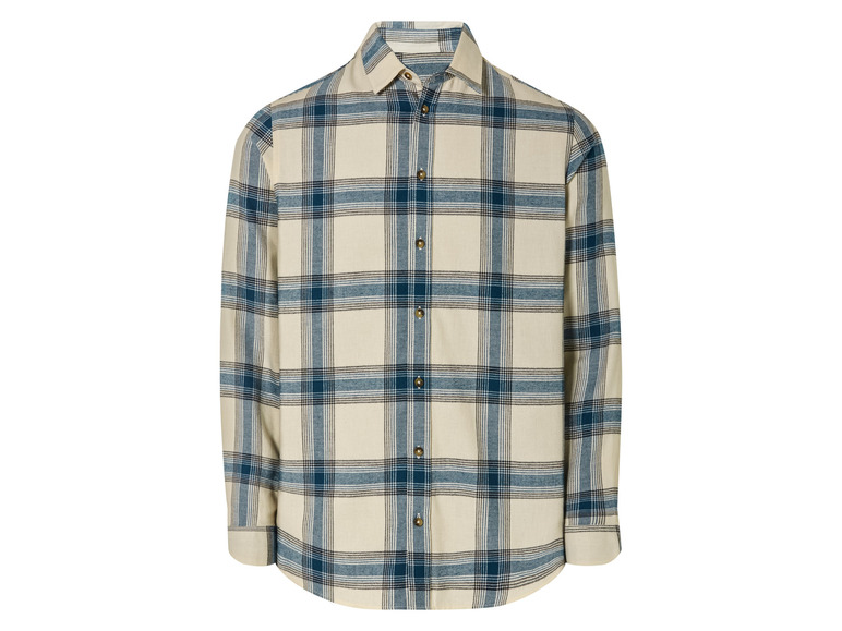Une chemise à carreaux blancs, bleus et beiges à manches longues.