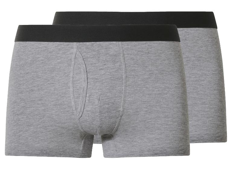 Deux boxers gris pour hommes avec une ceinture noire.