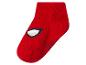 Chaussette rouge pour enfant avec motif de masque de super-héros.