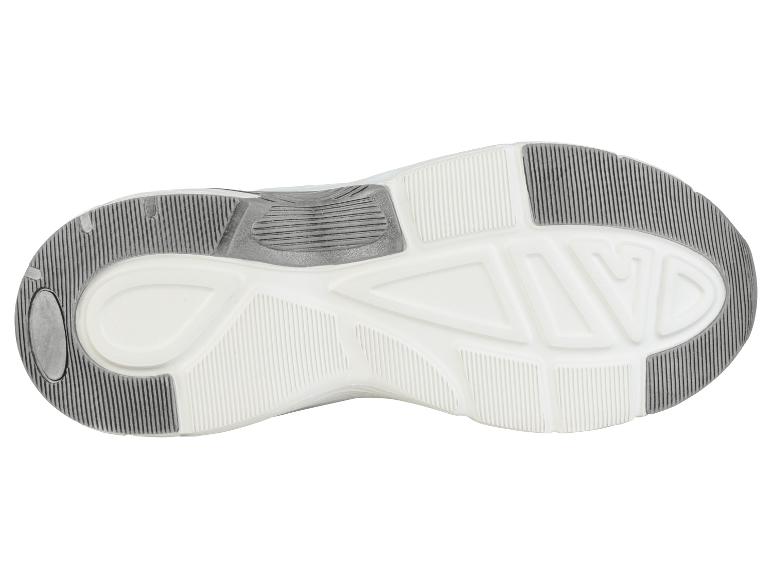 Witte en grijze sneakerzool met tractiepatroon.