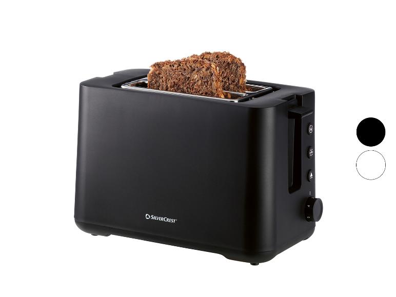 Zwarte 2-sleufs broodrooster met volkorenbrood, met bedieningsknoppen en een bruiningsknop.