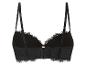 Un soutien-gorge noir avec un bord en dentelle.