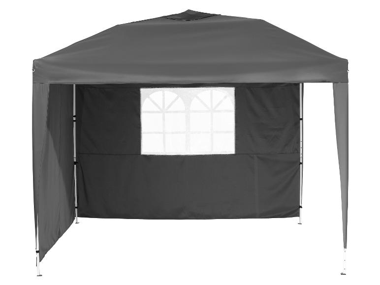 Een grijs partytent met een raam.