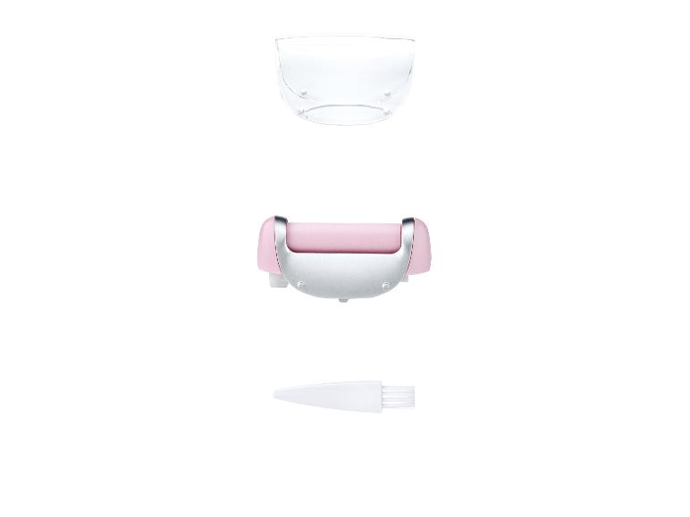 Épilateur rose, bol transparent et brosse de nettoyage.