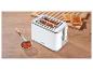 Silvercrest broodrooster met toast en jam op een houten tafel.