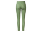 Jeans skinny vert foncé pour femme.