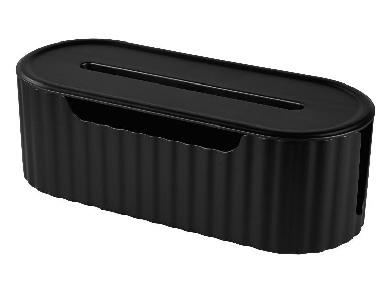 Boîte de gestion de câbles ovale noire avec un design nervuré