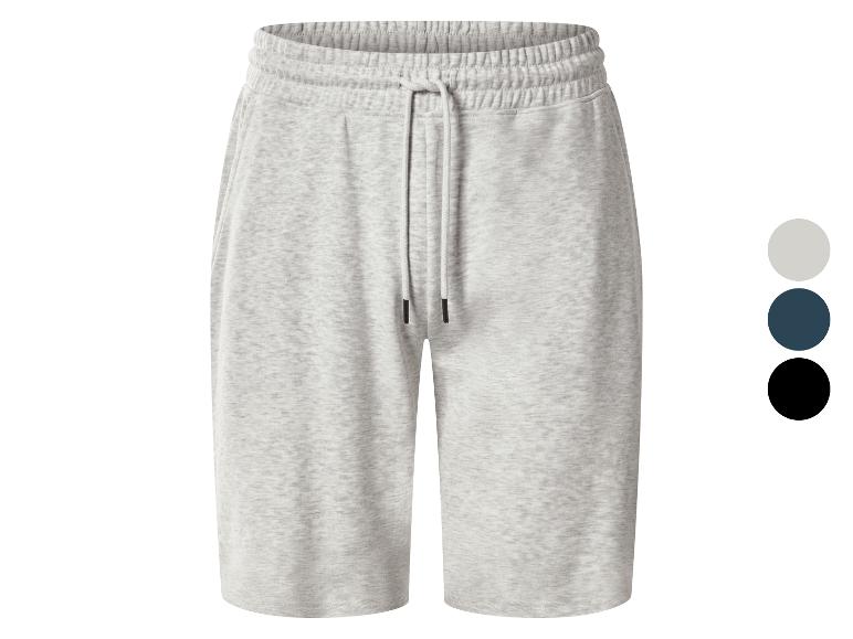 Grijze gemêleerde sweatshorts met trekkoord en kleurstalen in grijs, donkerblauw en zwart.