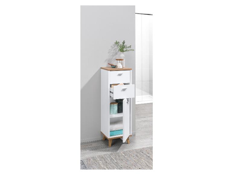 Armoire de salle de bain blanche avec deux tiroirs, une porte et des pieds en bois.