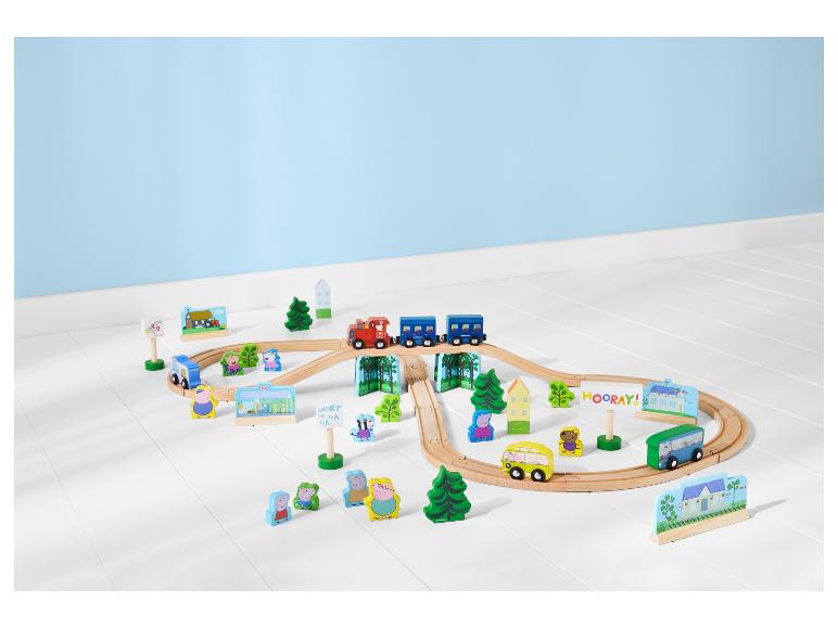 Circuit de train en bois Peppa Pig avec train, bus et figurines.