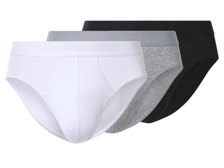 Trois slips pour hommes en blanc, gris et noir.
