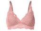 Soutien-gorge en dentelle rose pâle avec bretelles réglables.