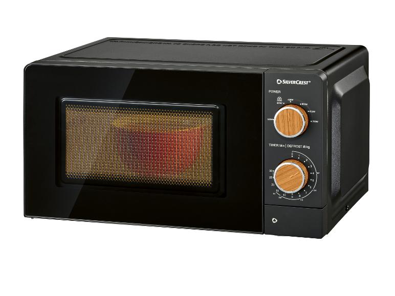 Zwarte magnetron met bedieningspaneel en hout-effect knoppen.