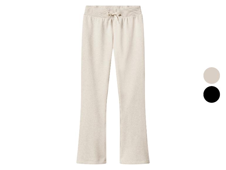 Pantalon de jogging beige pour femme à jambes droites avec cordon de serrage à la taille.