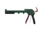 Groen en rood kitpistool op een witte achtergrond