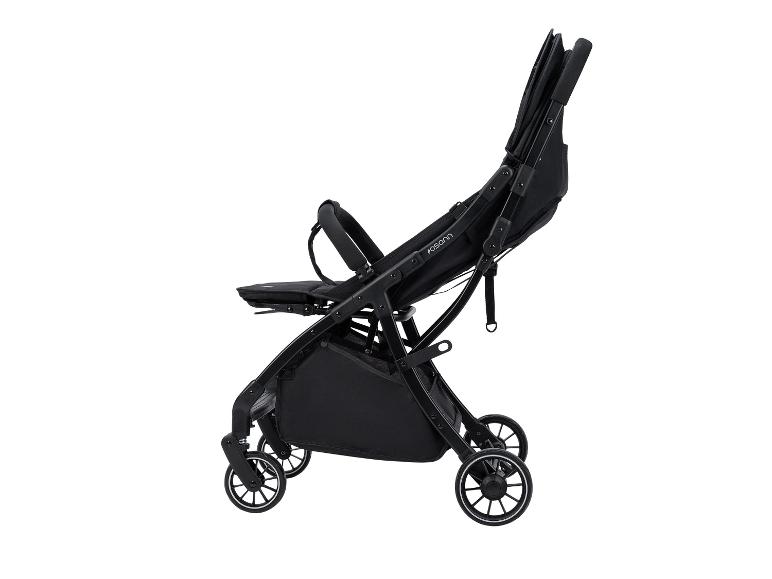 Poussette Joovy noire pliée.