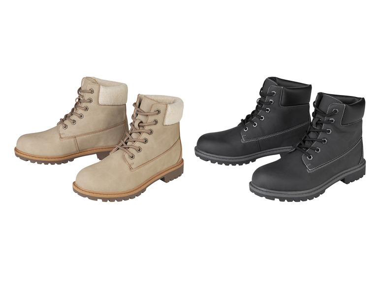 Beige en zwarte leren laarzen met veters.