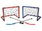 Ensemble de hockey au sol avec deux buts, deux crosses et un palet.