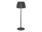 Lampadaire moderne avec abat-jour plissé noir et base ronde.