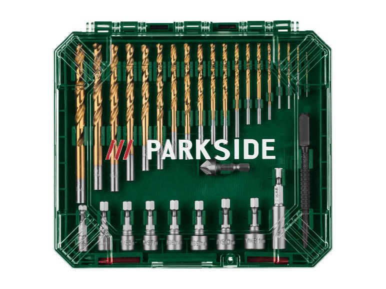 Boor- en bitset in een groene doos met gereedschap en de tekst 'PARKSIDE'.