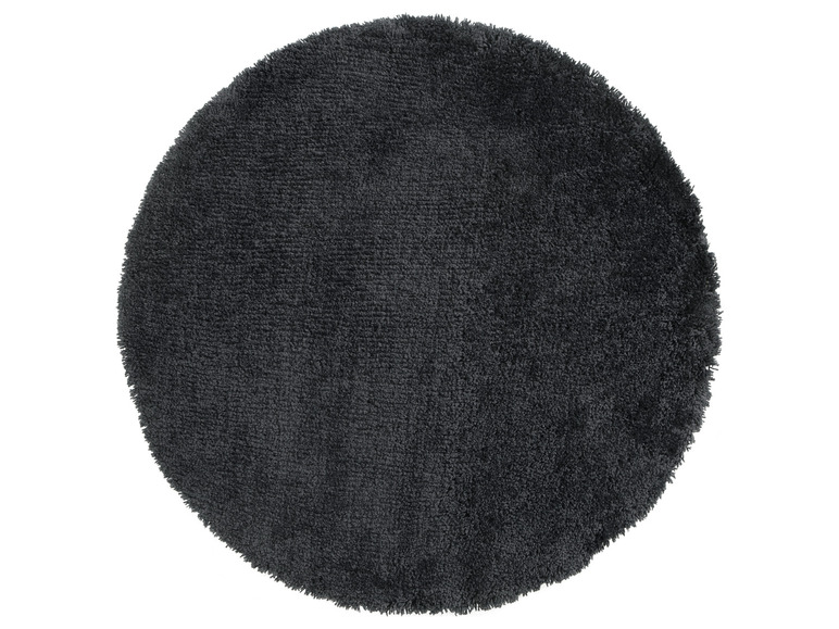 Rond grijs vloerkleed met pluche textuur.
