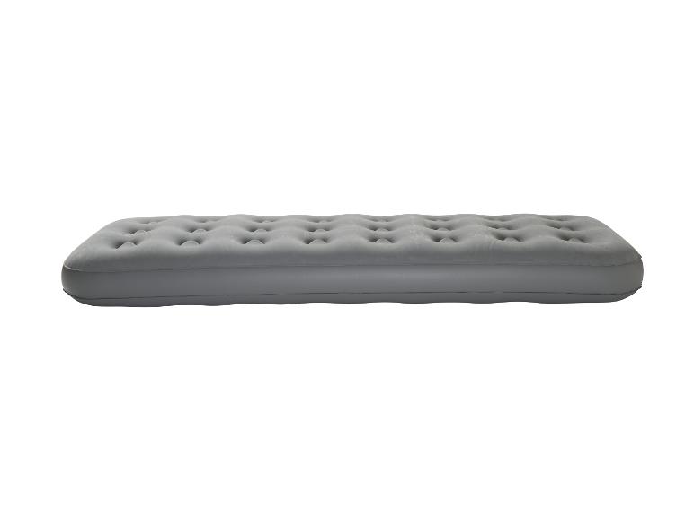 Matelas gonflable gris avec une surface capitonnée