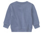 Un sweat-shirt bleu à manches longues pour bébé.