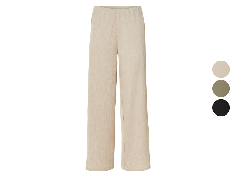 Pantalon large beige avec taille élastique.