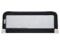 Barrière de lit Safety 1st noire avec maille blanche pour la sécurité des enfants.