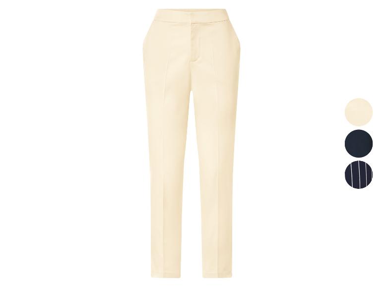 Crèmekleurige damesbroek met kleurstalen voor crème, marineblauw en gestreept marineblauw.