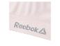 Soutien-gorge de sport rose clair avec une bande logo grise.