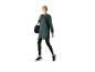 Femme en tunique verte et leggings noirs JETTE SPORT, portant un sac de sport noir.