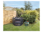 Compostage de jardin : composteur, bac et clôture en bois.