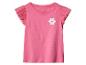 Roze T-shirt met korte mouwen, ruches van tule mouwen en een witte bloemapplicatie.