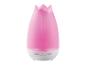 Diffuseur d'huiles essentielles rose en forme de tulipe avec boutons en bas.